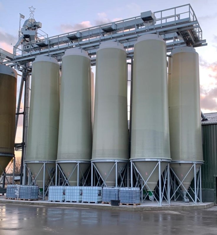 Series of GRP silos of Brinkmann Technology GmbH for the storage of products.